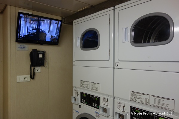Laundry room complete with a TV