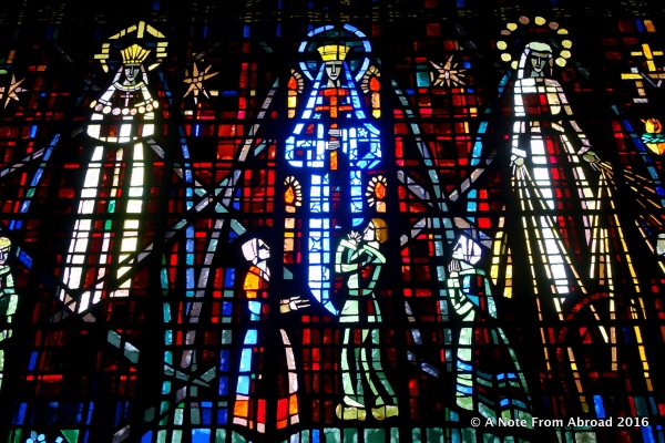 Example of one of the many stained glass windows that run down both sides